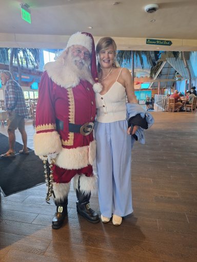 Soledad Music Official with Santa at a Margaritaville resort in Florida during the holidays